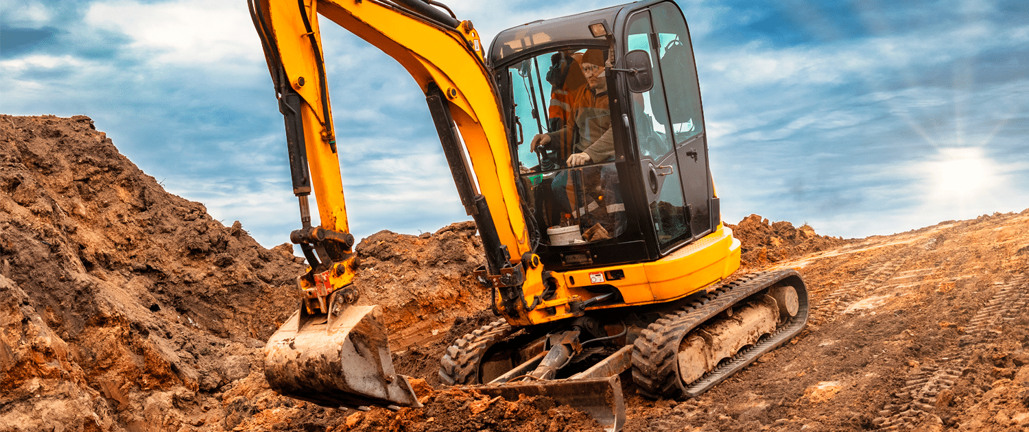 Bagr při práci v Jílovém u Prahy